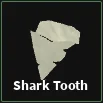 shark tooth item in dig